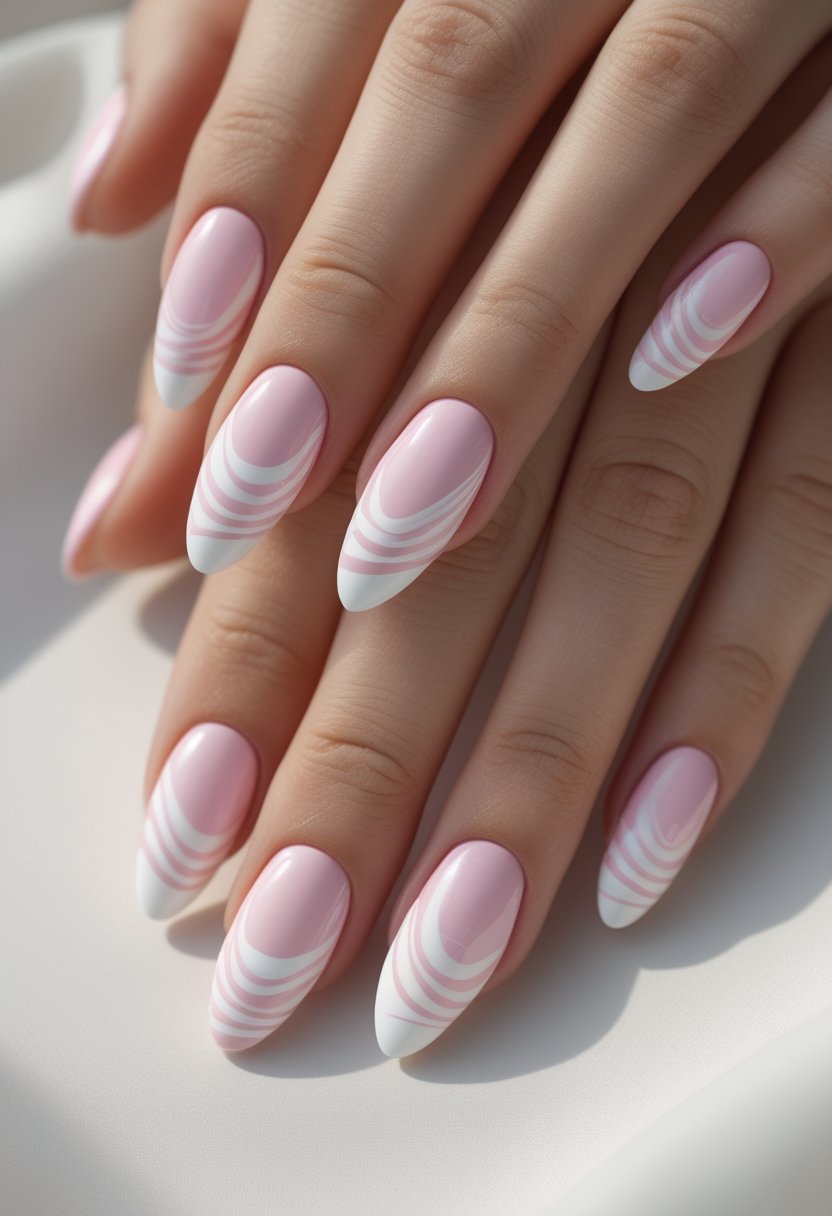 Close-up of manicured hands with glossy pink and white swirl-patterned nails.